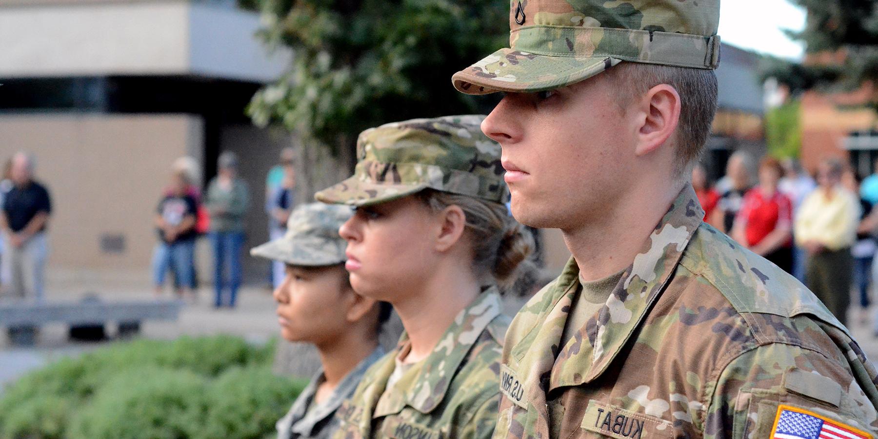 Three military students in fatigues